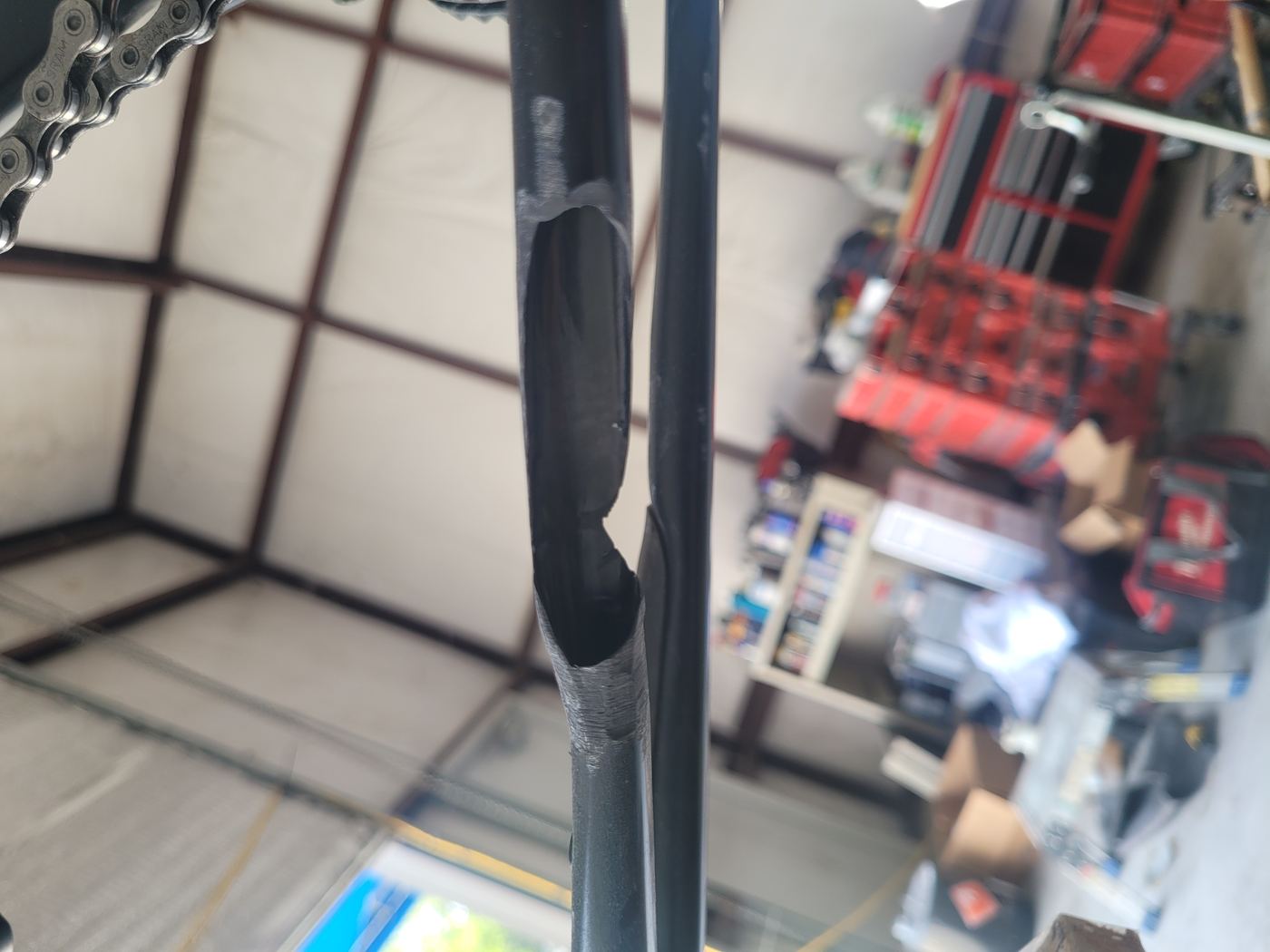 Carbon bicycle frame — cracked tube before repair