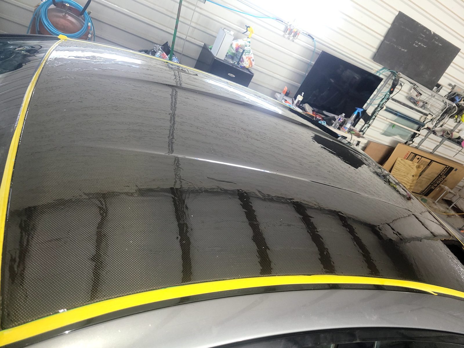 BMW M6 carbon fiber roof stripped and resurfaced with fresh gloss clear coat
